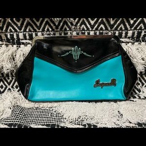 Sourpuss pinstripe kisslock purse